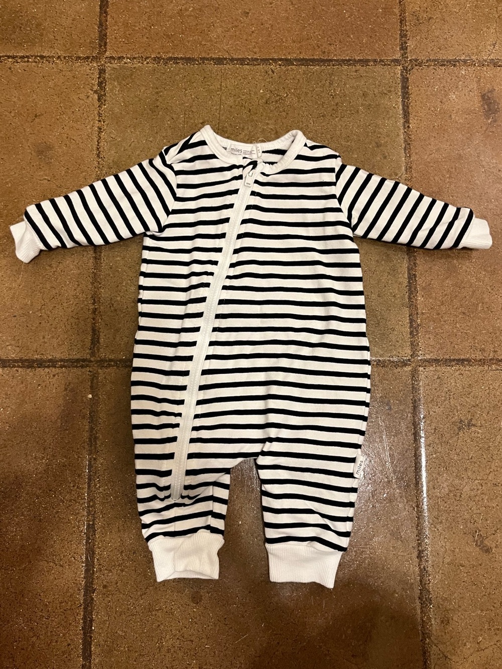 Black and white striped miles the label baby bodysuit 3m